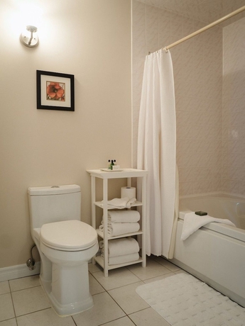 Imagen de la habitación del Hotel Green Acres Inn. Foto 14