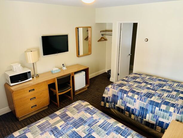 Imagen de la habitación del Hotel Green Acres Motel. Foto 18