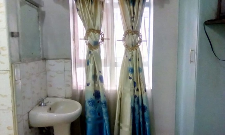 Imagen de la habitación del Hotel Green Apple Guest House. Foto 10