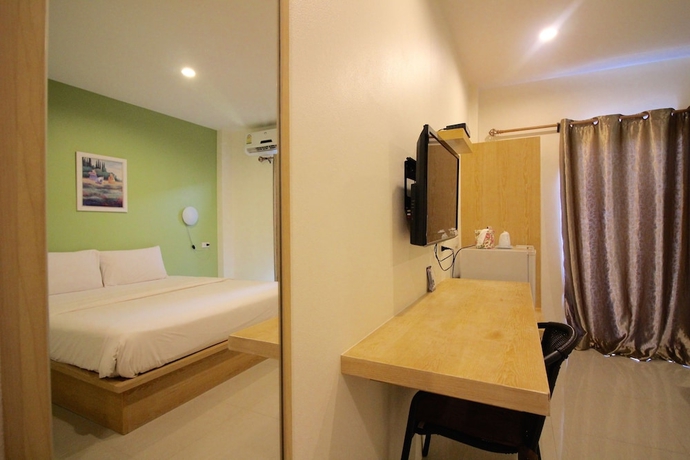 Imagen de la habitación del Hotel Green Apple Villa. Foto 9