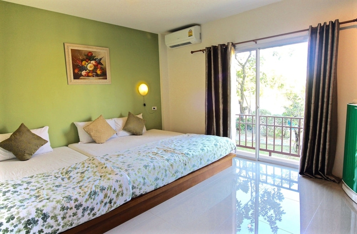 Imagen de la habitación del Hotel Green Apple Villa. Foto 10