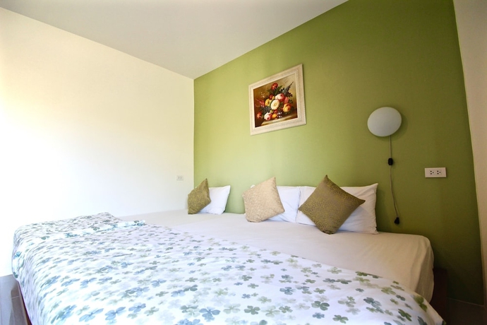 Imagen de la habitación del Hotel Green Apple Villa. Foto 11