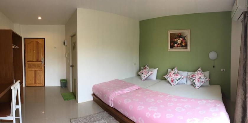 Imagen de la habitación del Hotel Green Apple Villa. Foto 12