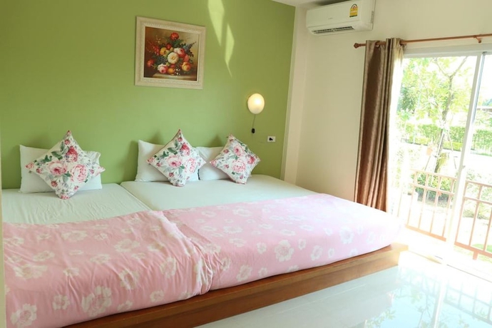 Imagen de la habitación del Hotel Green Apple Villa. Foto 13