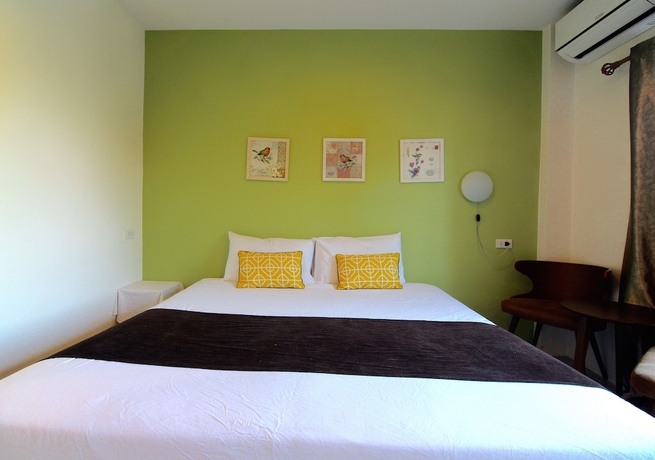 Imagen de la habitación del Hotel Green Apple Villa. Foto 16