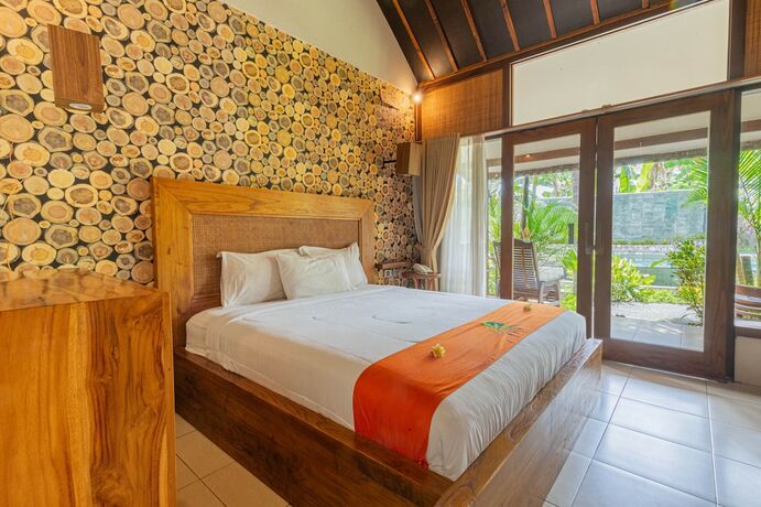 Imagen de la habitación del Hotel Green Asri. Foto 17