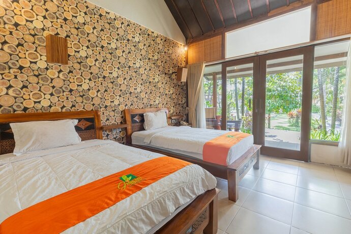 Imagen de la habitación del Hotel Green Asri. Foto 19