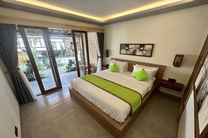 Imagen de la habitación del Hotel Green Bali Guest House. Foto 11