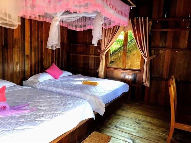 Imagen de la habitación del Hotel Green Bamboo Lodge. Foto 3