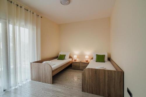 Imagen general del Hotel Green Bay Apartments Morinj. Foto 6