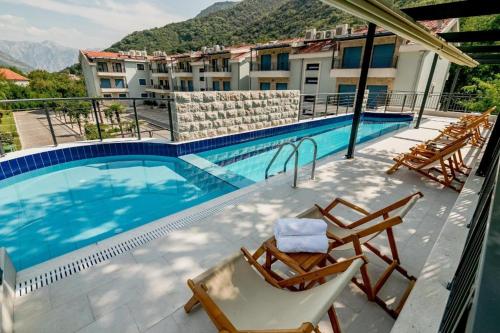 Imagen general del Hotel Green Bay Apartments Morinj. Foto 15