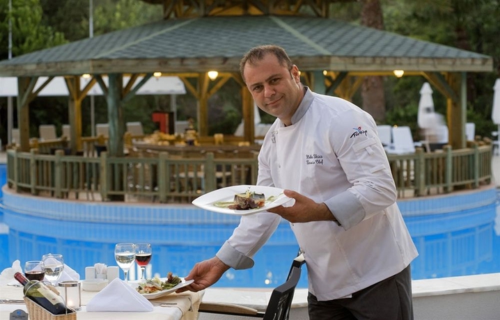 Imagen del bar/restaurante del Hotel Green Bay Resort And Spa. Foto 3