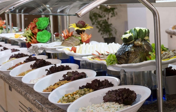 Imagen del bar/restaurante del Hotel Green Bay Resort And Spa. Foto 5