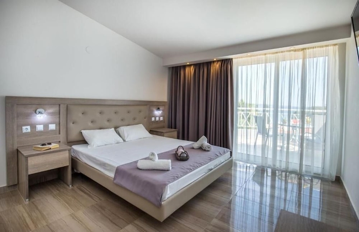 Imagen de la habitación del Hotel Green Bay Thassos. Foto 6