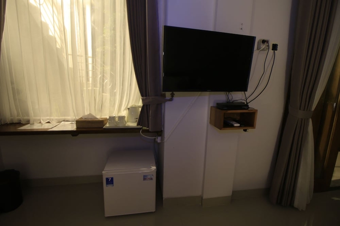 Imagen de la habitación del Hotel Green Beach Inn. Foto 16