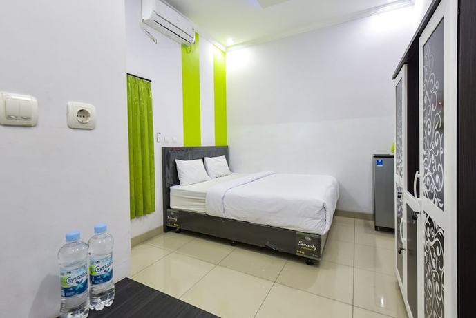 Imagen de la habitación del Hotel Green Belt Kost Exclusive. Foto 5