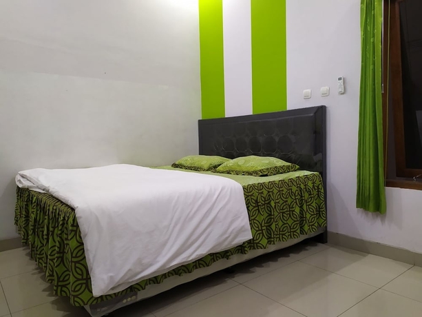 Imagen de la habitación del Hotel Green Belt Kost Exclusive. Foto 6