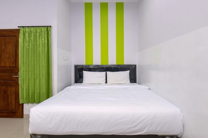 Imagen de la habitación del Hotel Green Belt Kost Exclusive. Foto 7