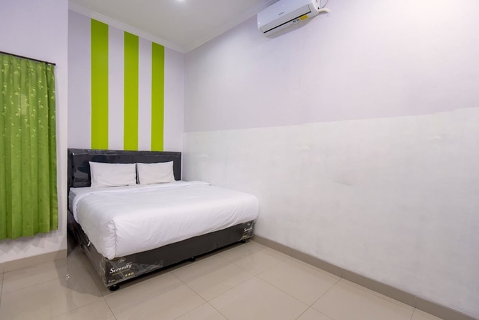 Imagen de la habitación del Hotel Green Belt Kost Exclusive. Foto 8