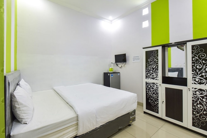 Imagen de la habitación del Hotel Green Belt Kost Exclusive. Foto 13