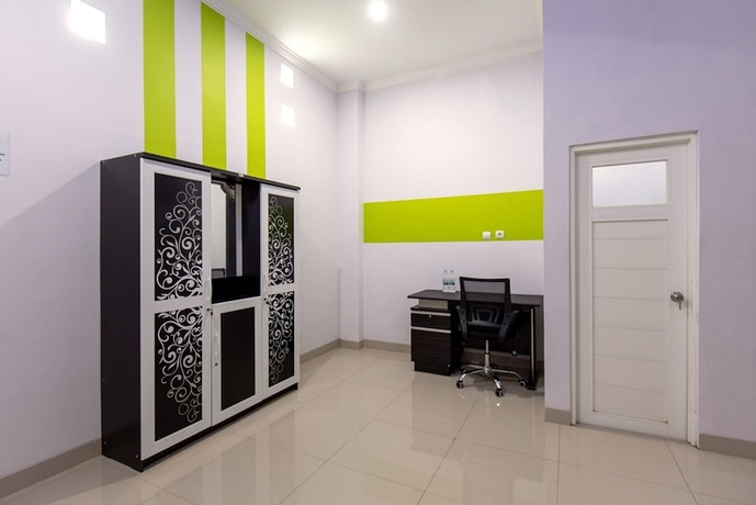 Imagen de la habitación del Hotel Green Belt Kost Exclusive. Foto 16