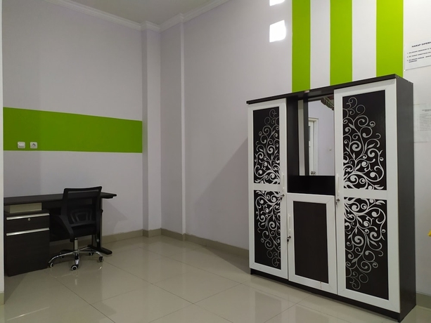 Imagen de la habitación del Hotel Green Belt Kost Exclusive. Foto 17