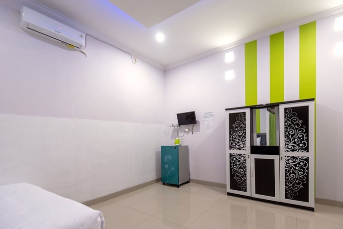 Imagen de la habitación del Hotel Green Belt Kost Exclusive. Foto 19