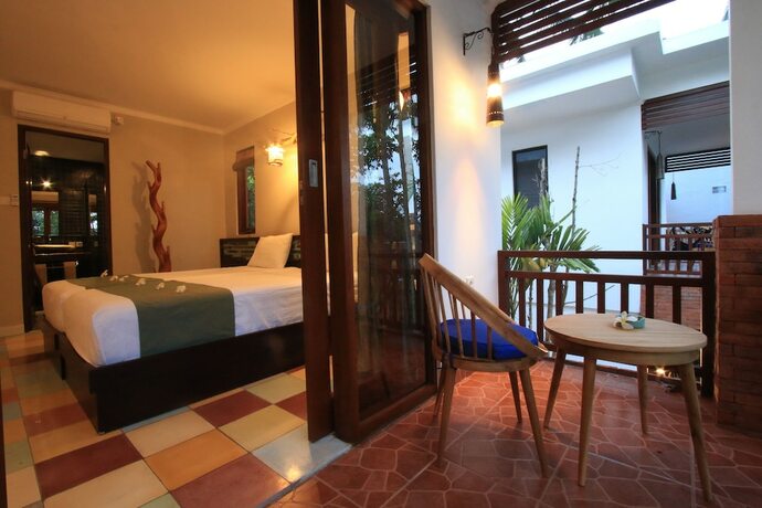 Imagen de la habitación del Hotel Green Bird Villa. Foto 18