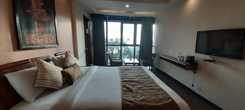 Imagen de la habitación del Hotel Green Castle Mall Road. Foto 13