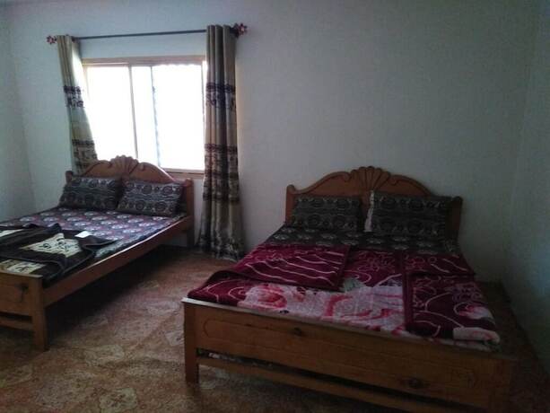 Imagen de la habitación del Hotel Green City And Restaurant. Foto 8