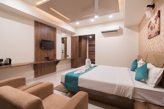 Imagen de la habitación del Hotel Green City, Gandhinagar. Foto 4