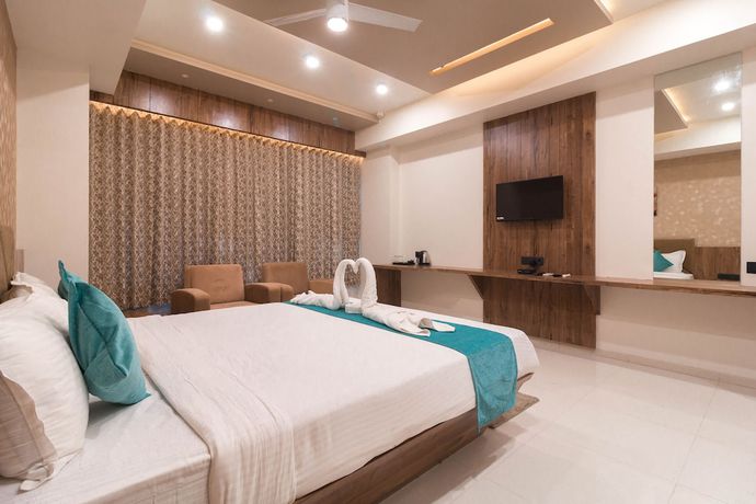 Imagen de la habitación del Hotel Green City, Gandhinagar. Foto 5