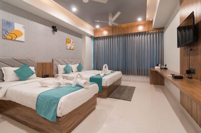 Imagen de la habitación del Hotel Green City, Gandhinagar. Foto 6