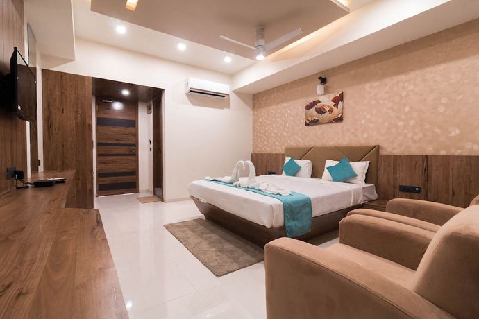 Imagen de la habitación del Hotel Green City, Gandhinagar. Foto 7