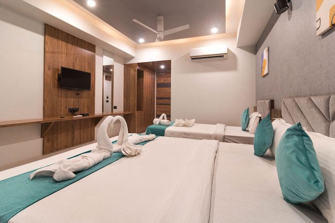 Imagen de la habitación del Hotel Green City, Gandhinagar. Foto 9