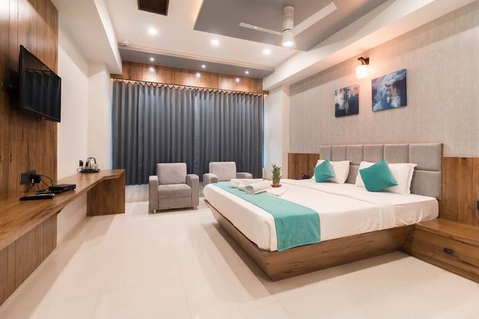 Imagen de la habitación del Hotel Green City, Gandhinagar. Foto 10