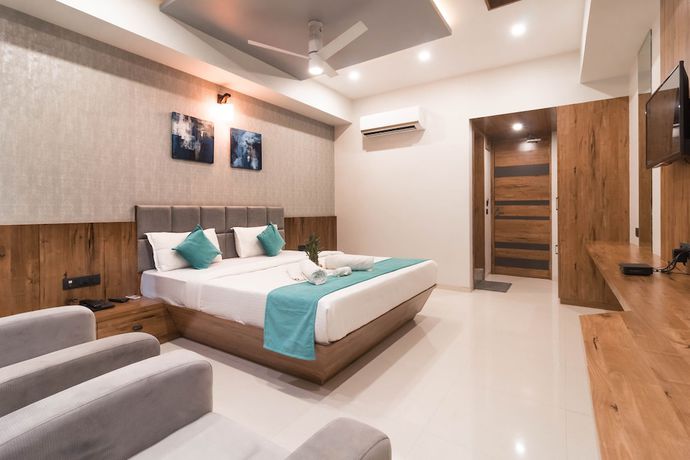 Imagen de la habitación del Hotel Green City, Gandhinagar. Foto 11