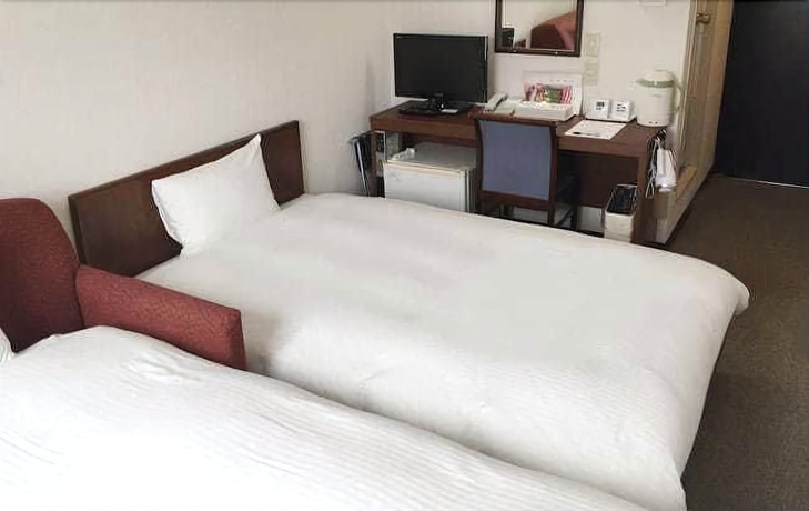 Imagen de la habitación del Hotel Green City, Sendai. Foto 2