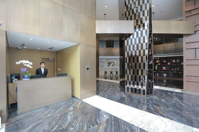 Imagen de los interiores del Hotel Green Court Residence Jinqiao Diamond Shanghai. Foto 14