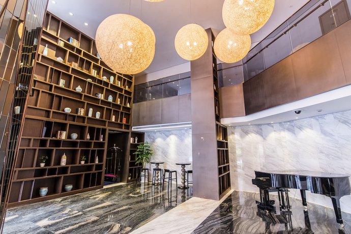 Imagen de los interiores del Hotel Green Court Residence Jinqiao Diamond Shanghai. Foto 15