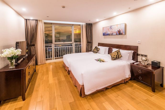 Imagen de la habitación del Hotel Green Court Residence Jinqiao Diamond Shanghai. Foto 10