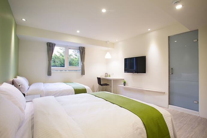 Imagen de la habitación del Hotel Green - Fengjia. Foto 11