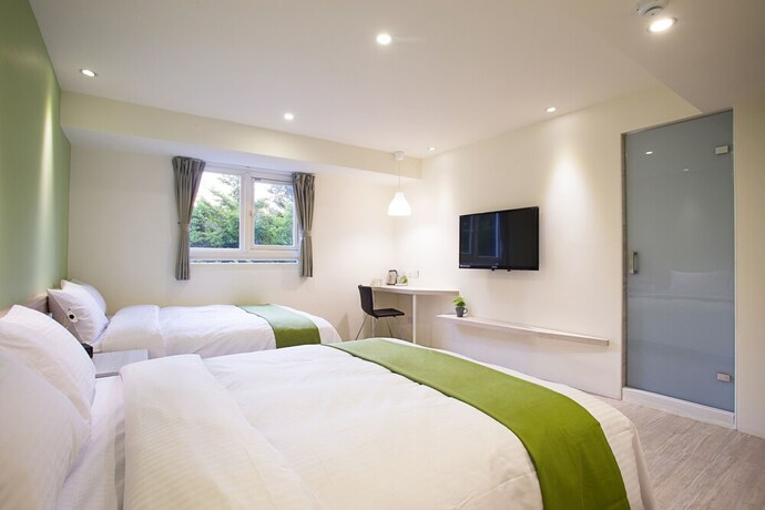 Imagen de la habitación del Hotel Green - Fengjia. Foto 16