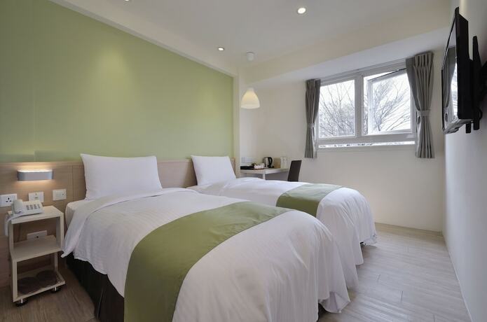 Imagen de la habitación del Hotel Green - Fengjia. Foto 19
