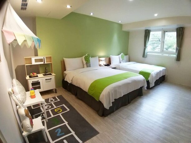 Imagen de la habitación del Hotel Green - Fengjia. Foto 20