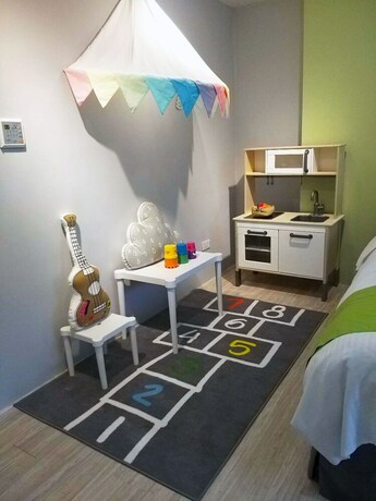 Imagen de la habitación del Hotel Green - Fengjia. Foto 21