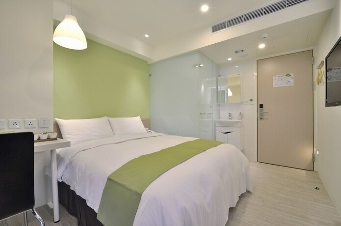 Imagen de la habitación del Hotel Green - Fengjia. Foto 25