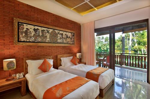 Imagen de la habitación del Hotel Green Field Resort Ubud. Foto 9