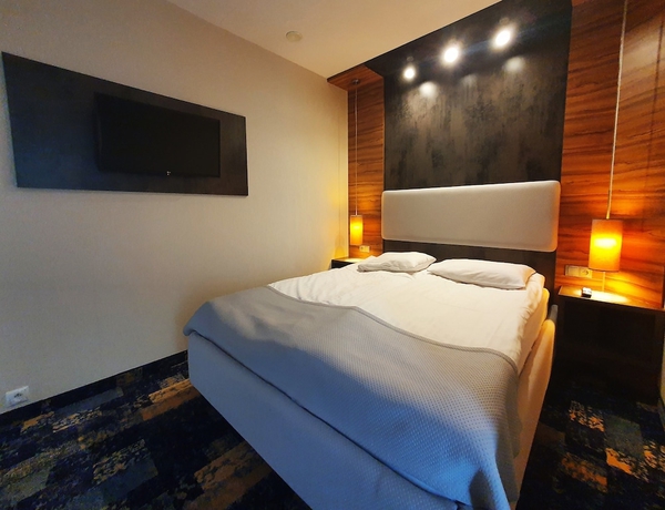 Imagen de la habitación del Hotel Green Garden, Aeropuerto Varsovia - Chopin. Foto 11