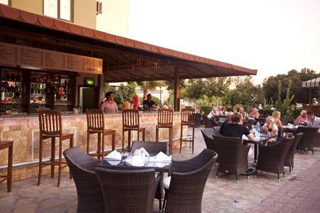 Imagen del bar/restaurante del Hotel Green Garden Apart and Suites. Foto 5